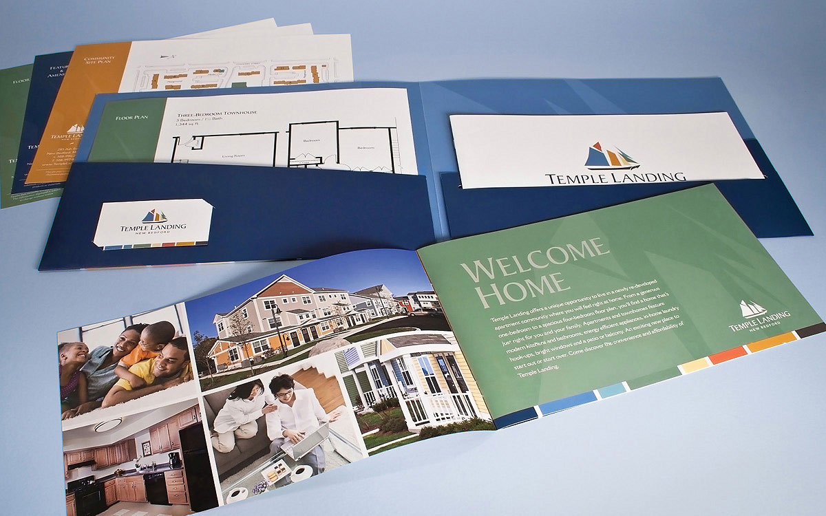 Photo of the marketing brochure system for Temple Landing showing the pocket folder, brochure, and floorpan inserts