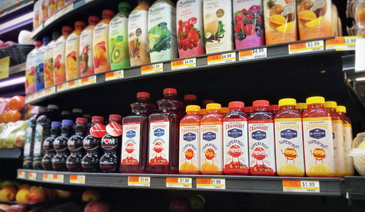 Bluewater Farms Cranberry Juice Bottle on Store Shelf