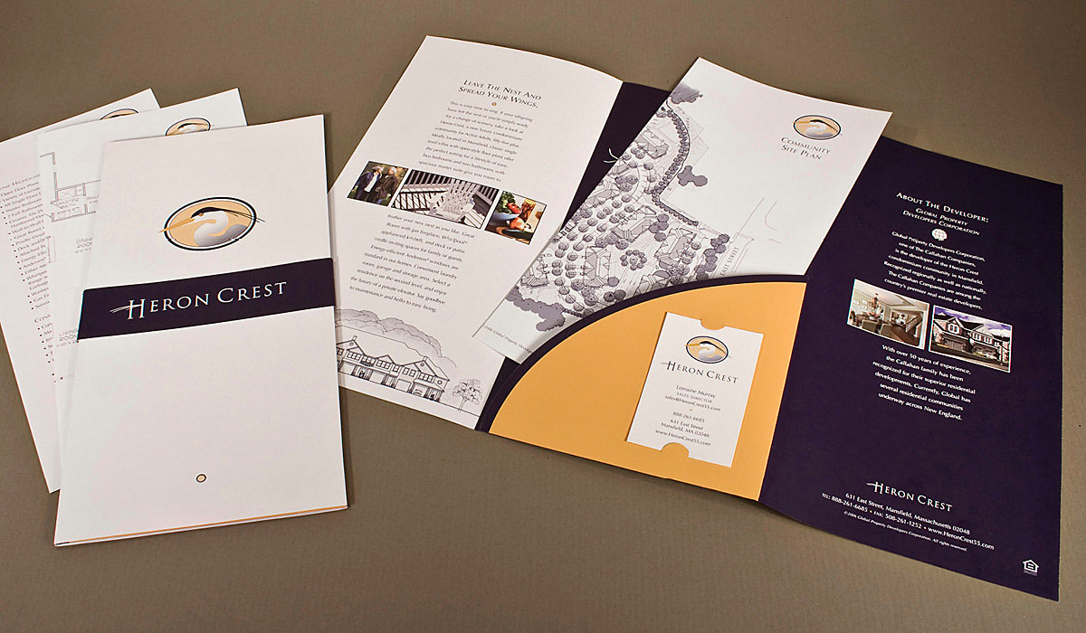 Photo of the Heron Crest marketing brochure system showing the brochure, pocket, and floorpan and site plan inserts